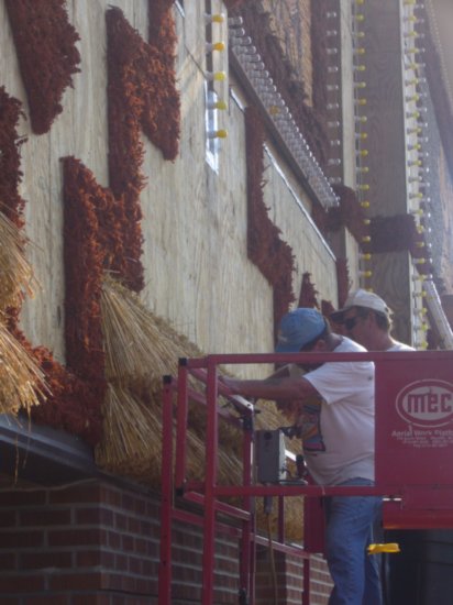 17 Workers decorating Corn Palace