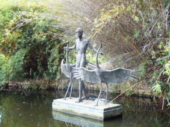 Statue in pond