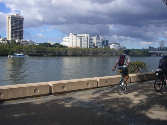 Unicycler along the riverbank