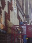 17 Workers decorating Corn Palace