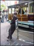 Manually turning a cable car