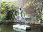 Statue in pond