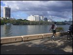 Unicycler along the riverbank