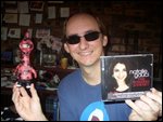 Colin with toy, Ray-ban's, and Australian Idol  CD