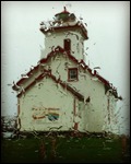 Wet lighthouse taken from our dry car.